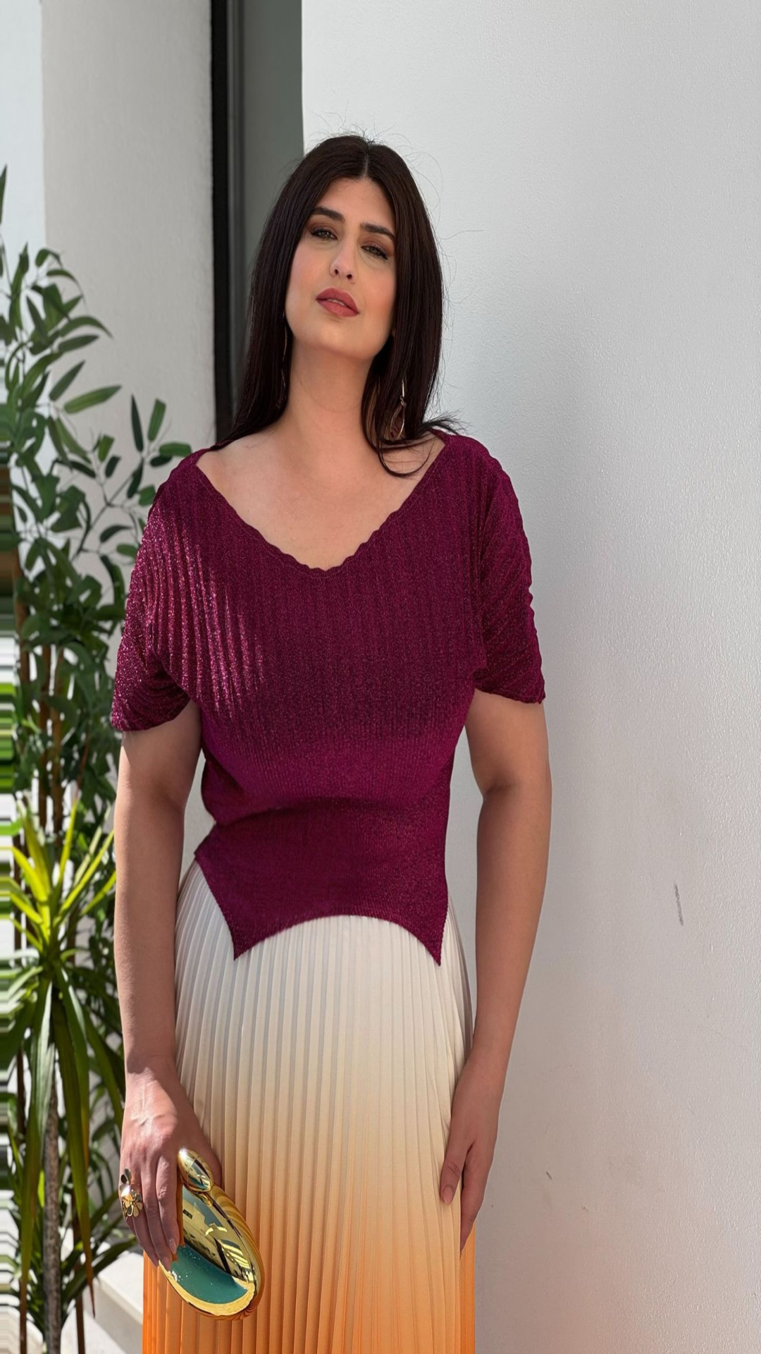 Conjunto de fiesta top y falda plisada