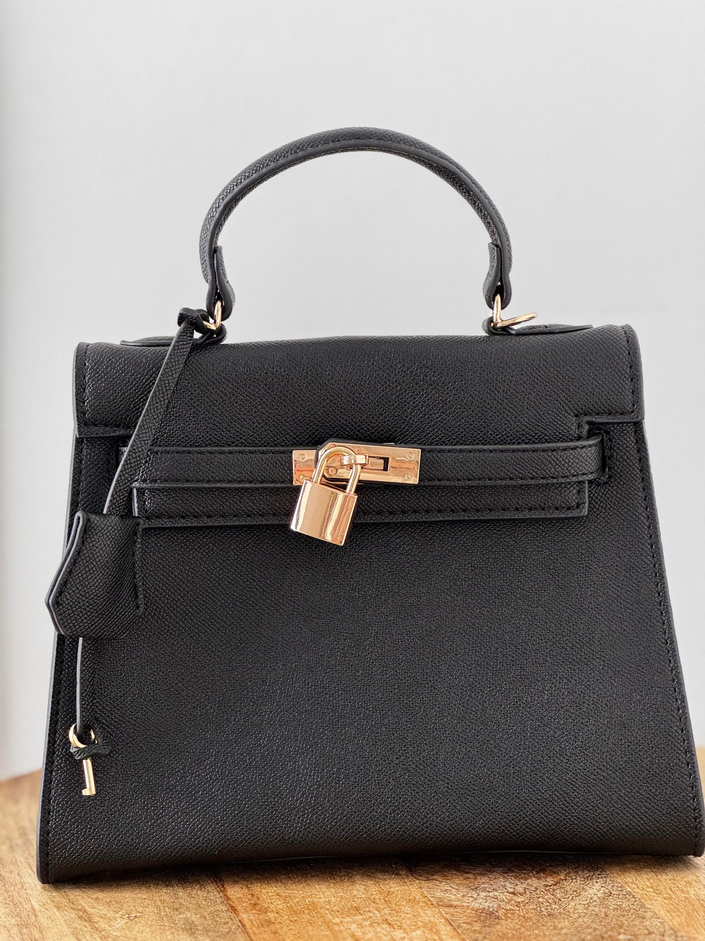 Bolso de mano candado