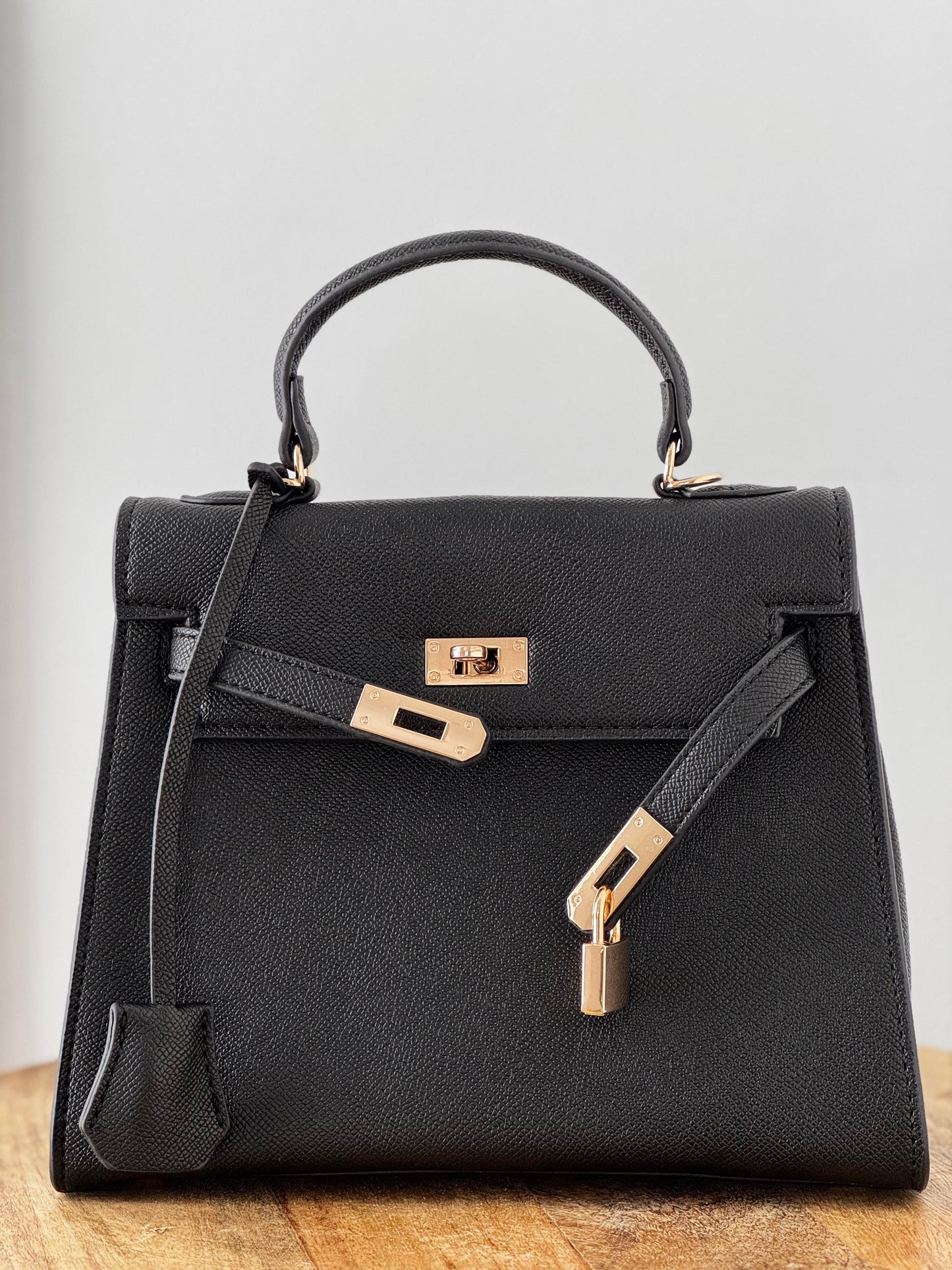 Bolso de mano candado