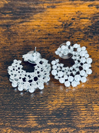 Pendientes asimétricos con perlas