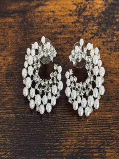 Pendientes asimétricos con perlas