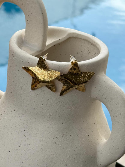 Pendientes estrella dorados