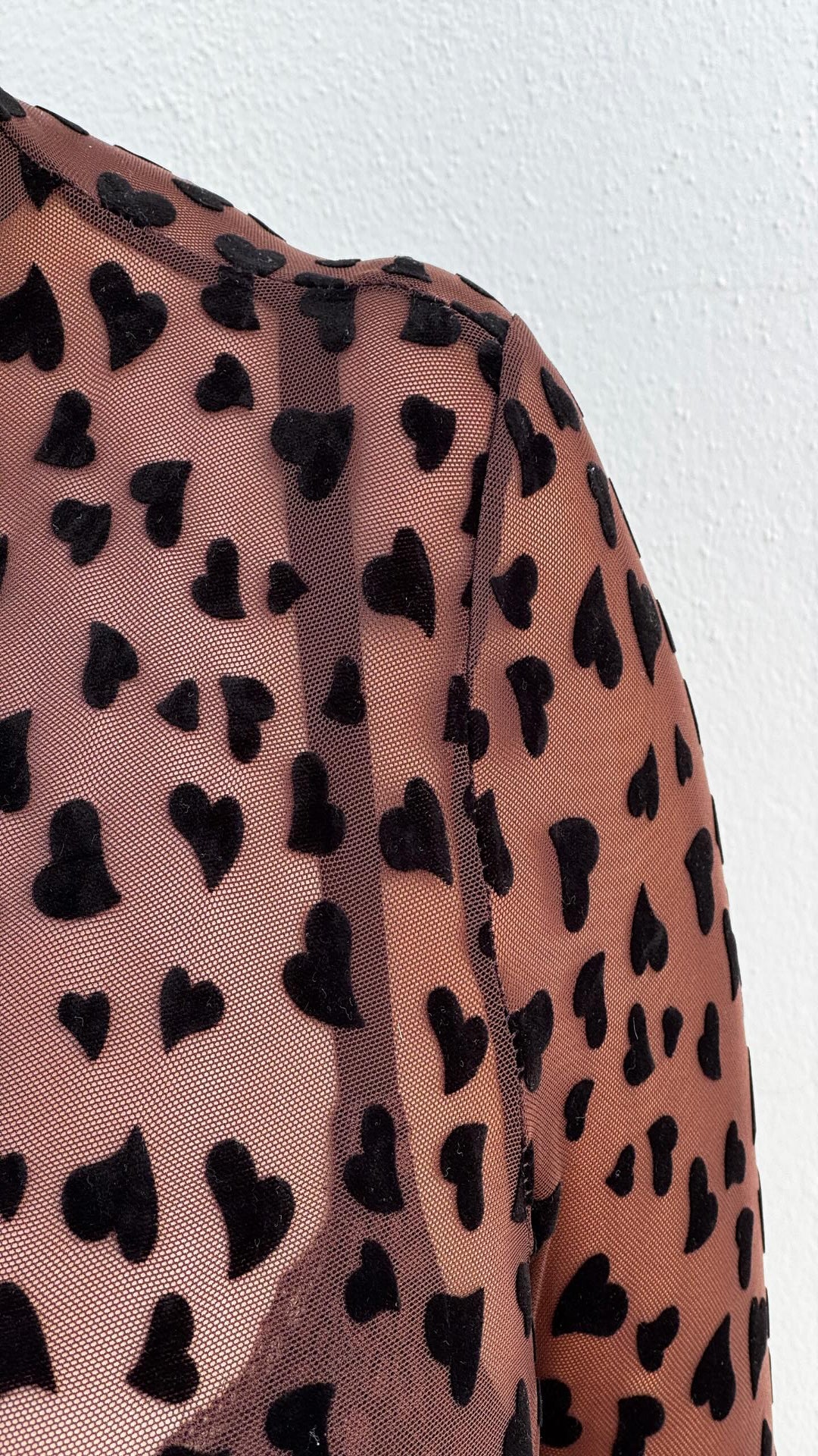 Top transparente corazones