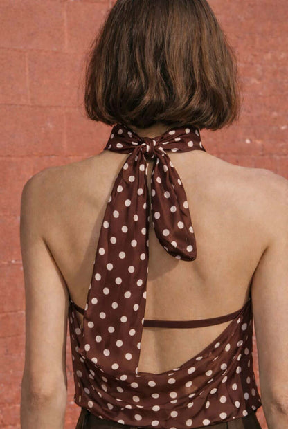 Top lunares con hebilla