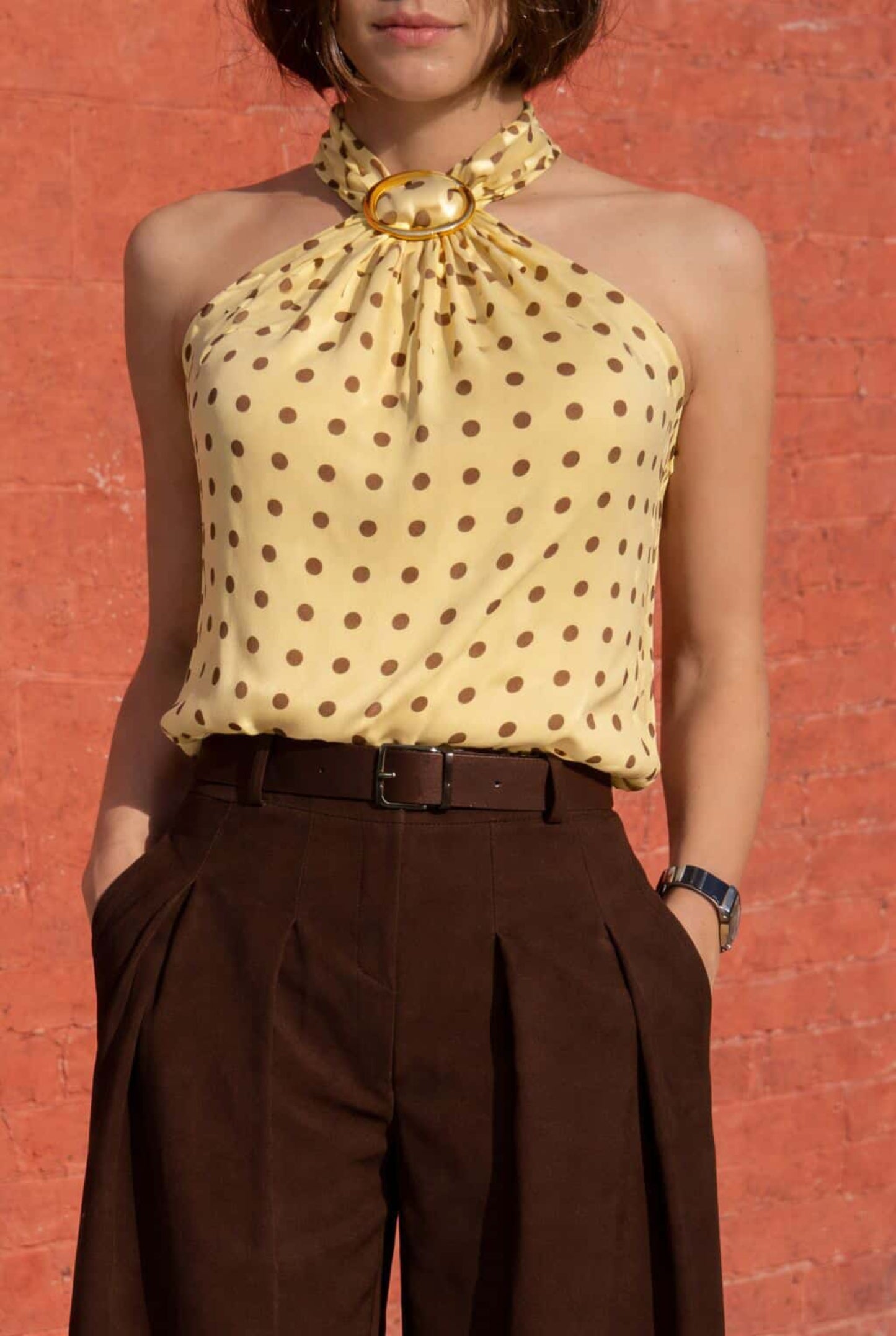Top lunares con hebilla