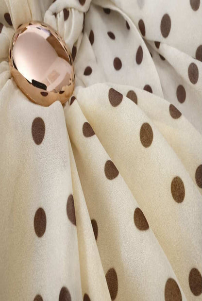 Top lunares con hebilla