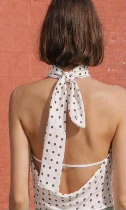 Top lunares con hebilla