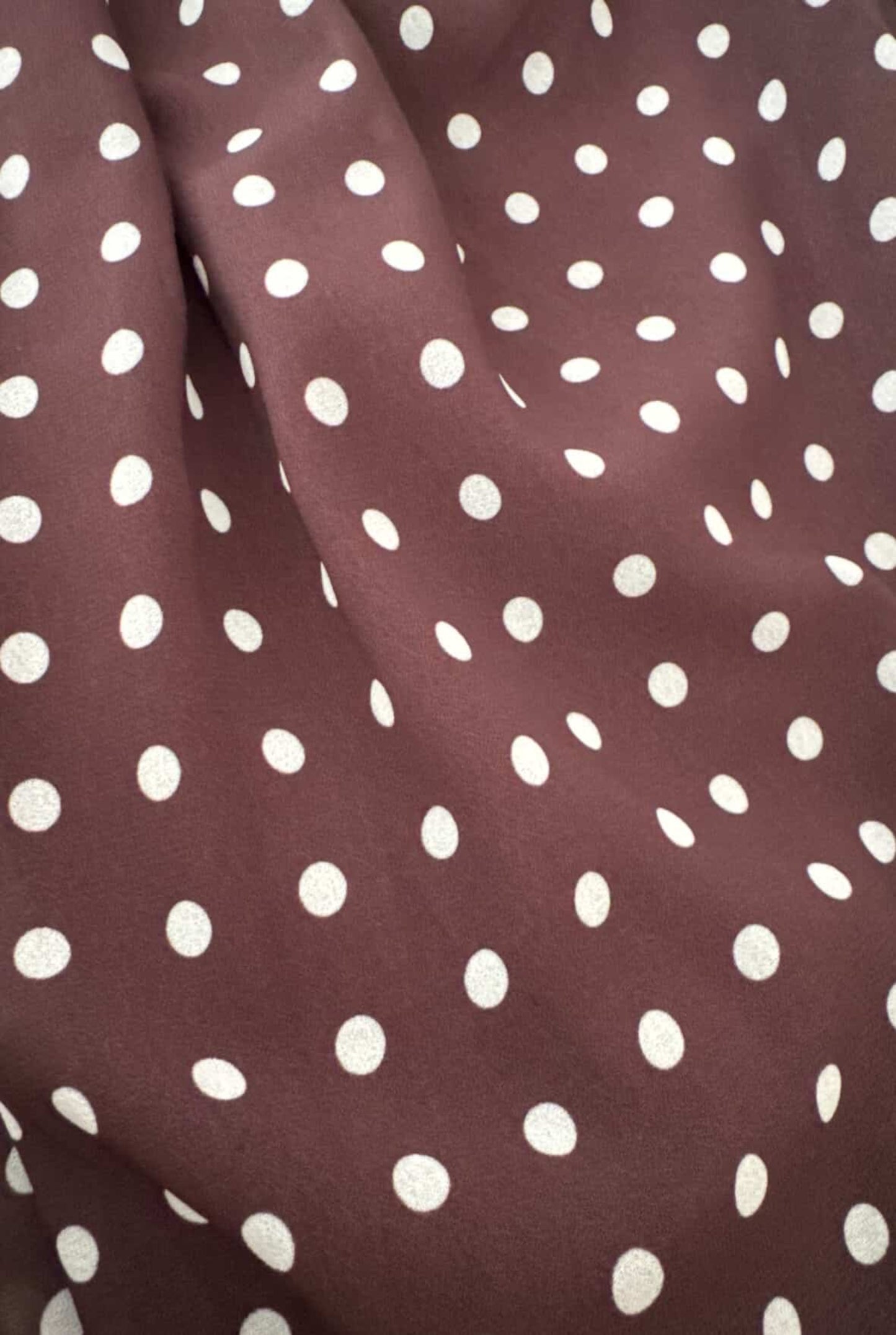 Top lunares con hebilla