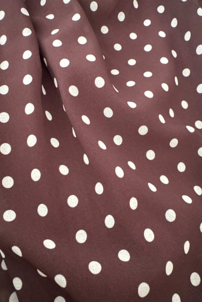 Top lunares con hebilla