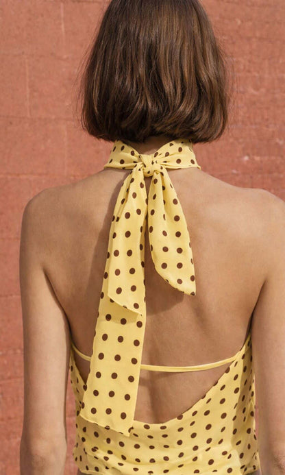 Top lunares con hebilla