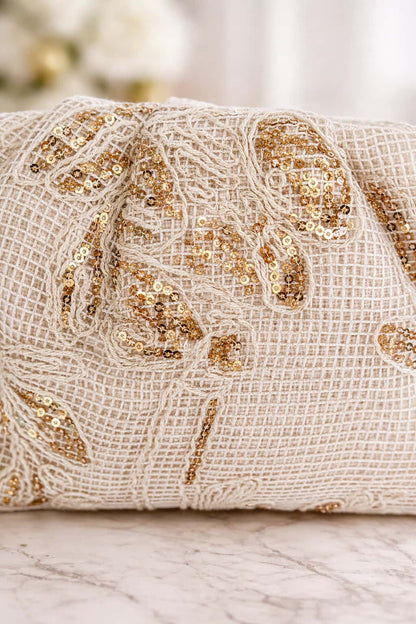 Bolso efecto rafia con lentejuelas