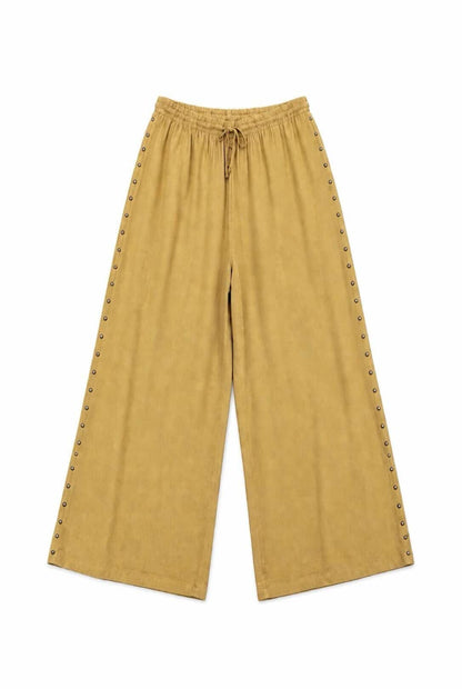 Pantalón fluido tachuelas