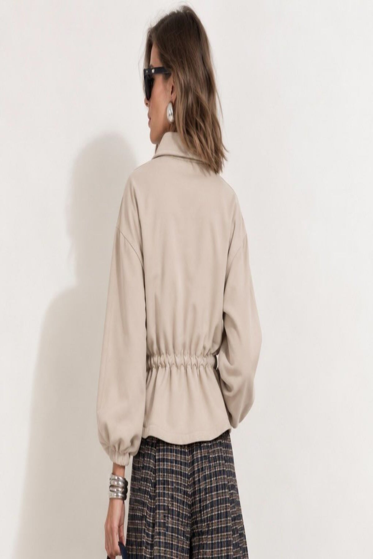 Sobrecamisa fluida ajustable