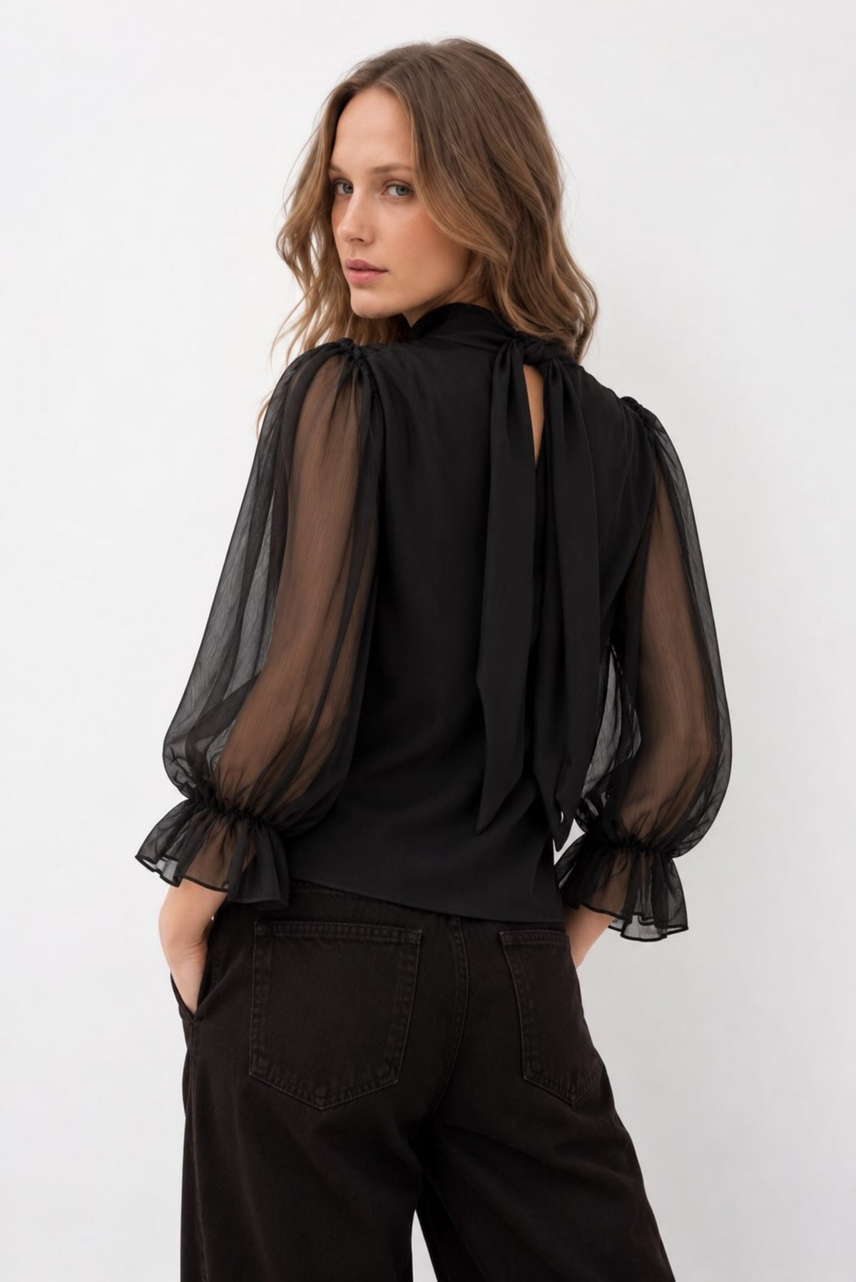 Blusa cruzada semitransparente
