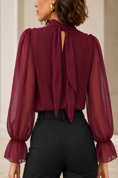 Blusa cruzada semitransparente