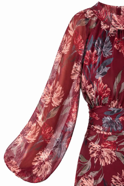 Vestido midi floral con volantes