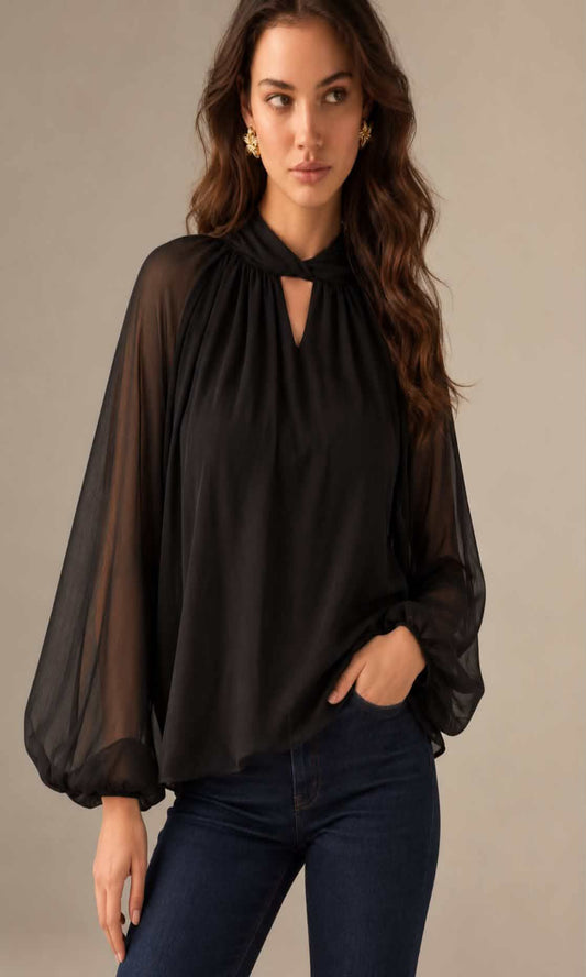 Blusa fluida con cuello alto