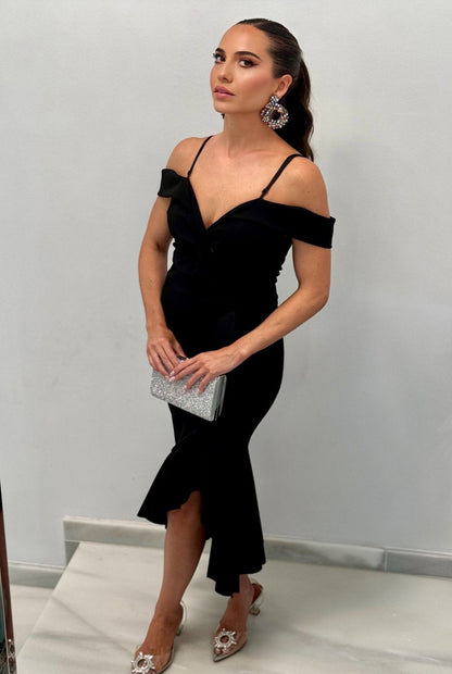 Vestido midi volantes